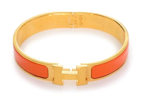 hermes white bangle bracelet|Hermes orange enamel bangle bracelet.